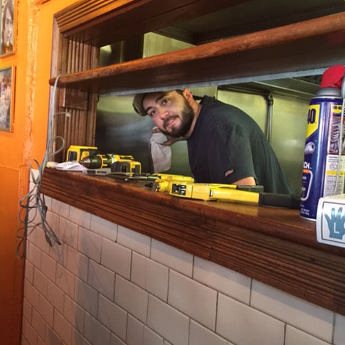 Randy Cappiello hard at work on site inside Benny's Burritos on Greenwich Ave in Manhattan.